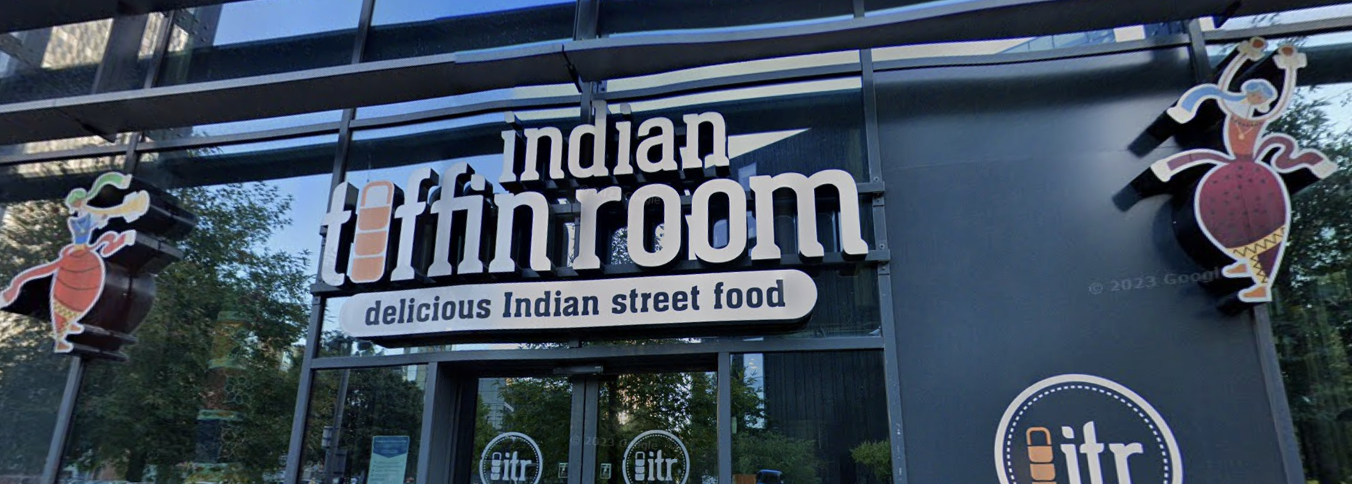 The Indian Tiffin Room sign showing things to do on Manchester First Street