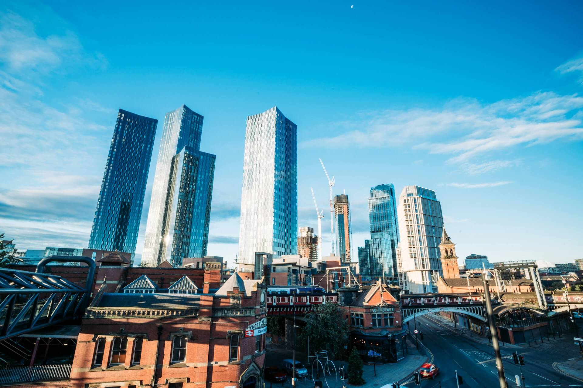 A view of Manchester city skyline showing Manchester living at the top